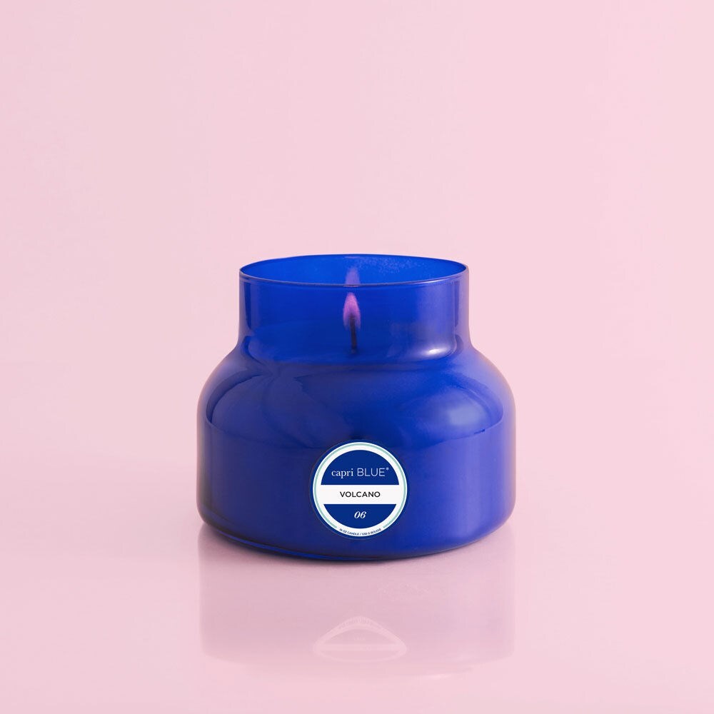 Capri Blue Volcano Signature 19 oz cobalt blue jar candle with tropical fruit and sugared citrus fragrance.