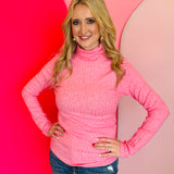 Fuchsia ribbed mock neck long sleeve top with fitted silhouette and soft stretchy knit.