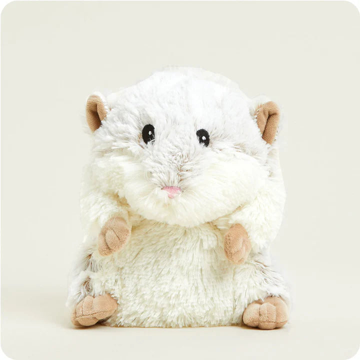 A soft, plush hamster toy, round and chubby with small ears and paws, designed to be microwavable.