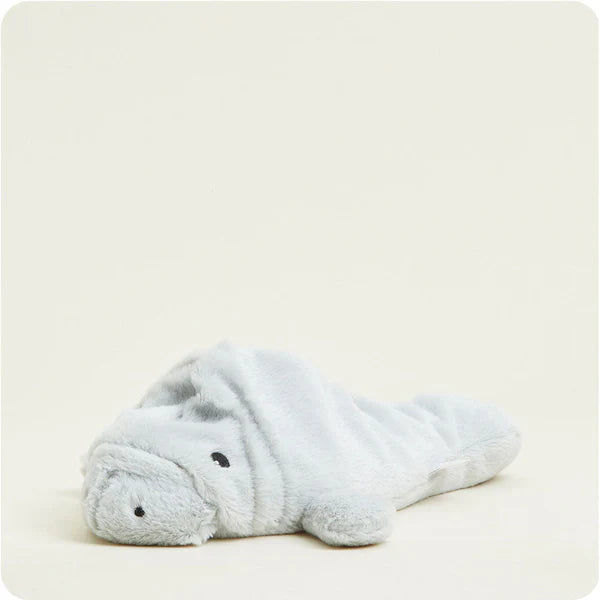Plush manatee Warmies, microwavable, lavender-scented, and weighted for soothing warmth and comfort.