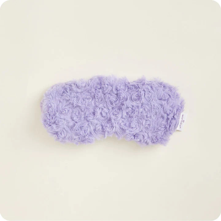 Curly Purple Warmies® Eye Mask, microwavable and lavender-scented, plush fabric, weighted for comfort, freezer safe.