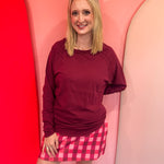 Cabernet cotton raglan top with thumbhole cuffs.