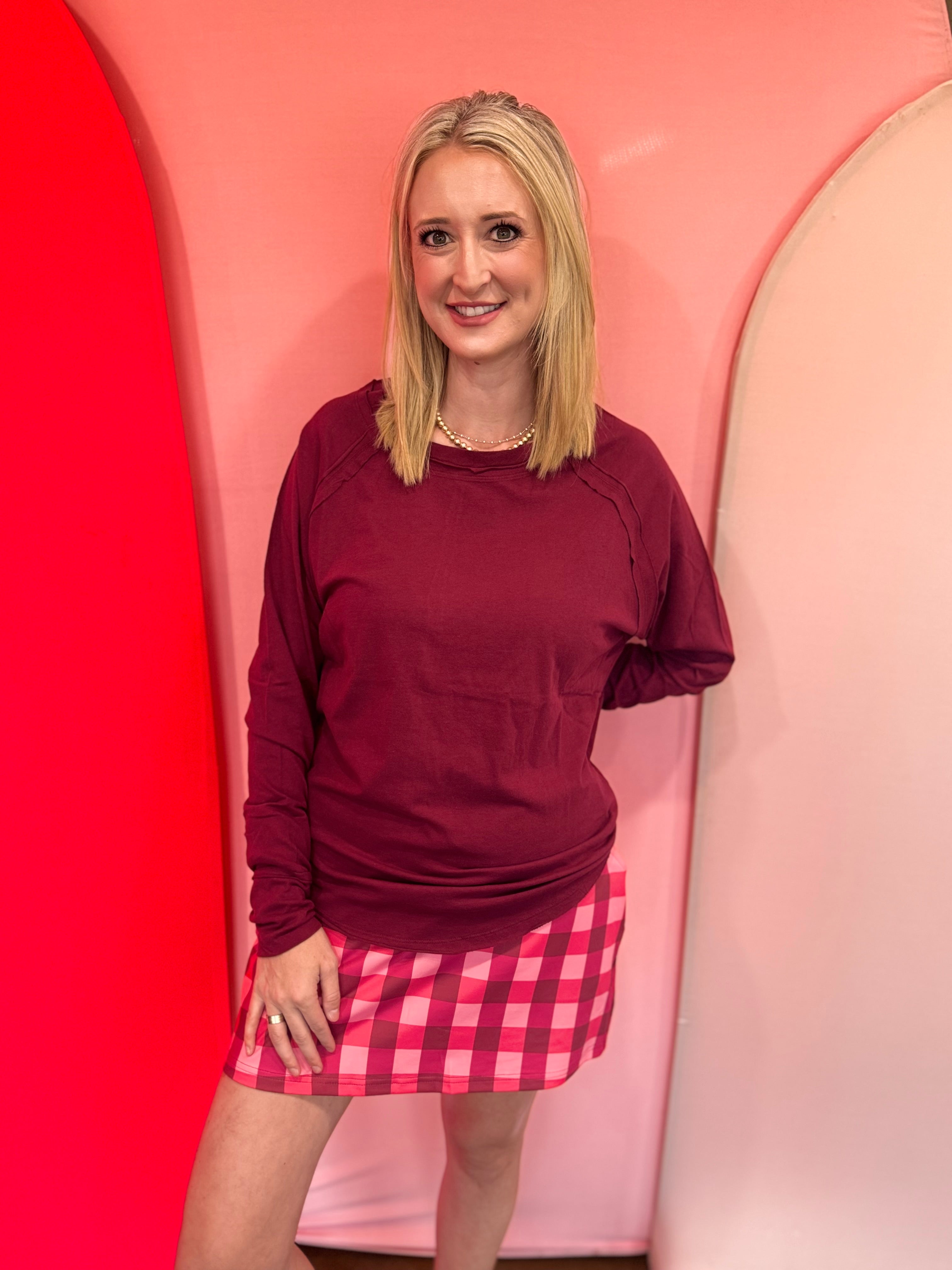Cabernet cotton raglan top with thumbhole cuffs.