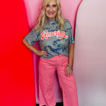 Camo patriotic top with red and white America graphic.