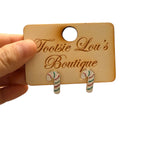 Gold candy cane stud earrings with red and green stripes, lightweight and festive.