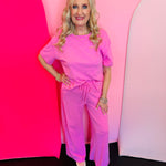Candy pink tee pant set with wide leg pants and relaxed short sleeve top