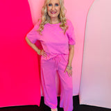 Candy pink tee pant set with wide leg pants and relaxed short sleeve top
