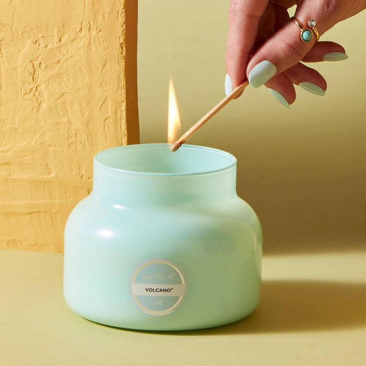 Volcano Aqua Petite Signature Candle 8oz – tropical citrus-scented petite candle in a bold aqua glass vessel with 40-hour burn time.
