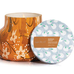 Capri Blue Pumpkin Dulce Petite Candle with festive pattern and warm pumpkin vanilla fragrance.