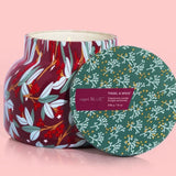 Capri Blue Tinsel & Spice Candle, 19oz, with festive patterned jar.