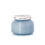 Capri Blue Volcano Caffè candle in blue ribbed glass with striped lid.
