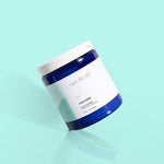 Volcano Scent Booster 21oz – long-lasting tropical citrus laundry booster with grapefruit and tangerine essential oils. 