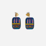 Colorful sardine tin earrings with gold heart studs and vintage inspired design.