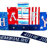 Patriotic HAPPY board with glitter letters and interchangeable holiday magnets.