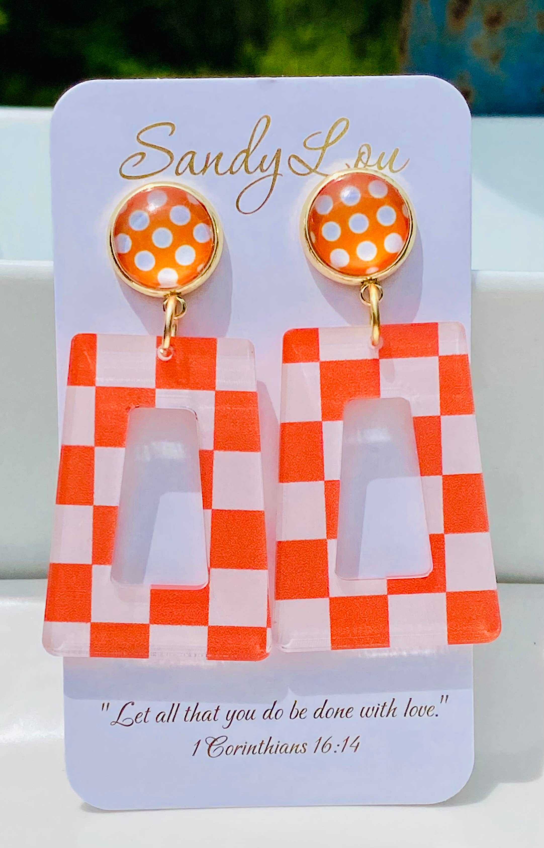  Orange and white checkered acrylic dangle earrings with orange polka dot stud.