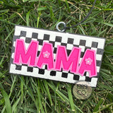 Checkered pink and black mama car freshie with hook and string hanging in car.
