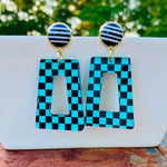 Teal and black checkered acrylic dangle earrings with black polka dot stud.