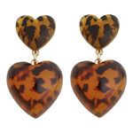 Double heart cheetah print acrylic drop earrings with lightweight layered heart design.
