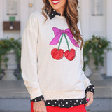 Cherry bow luxe pullover with foil cherry graphic and soft stretch fabric