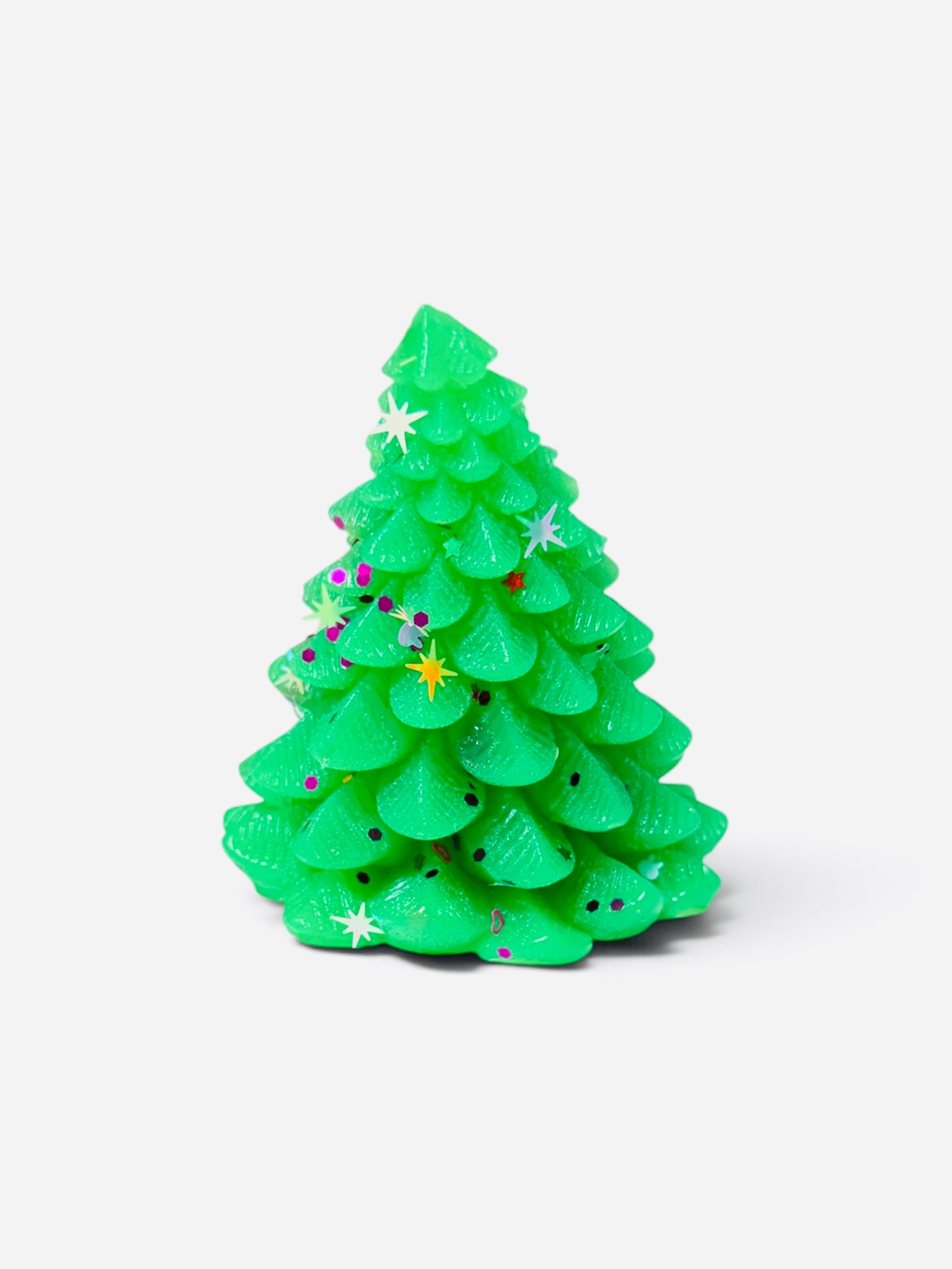 Green Christmas tree squishy with festive stars and glitter accents.
