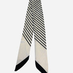 Black and ivory twilly scarf with sleek diagonal stripe design.