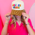 Coffee Club hat with multicolor embroidery and brown polka dot bill.