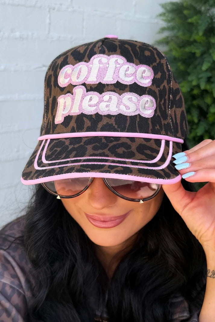 Leopard print Coffee Please hat with pink contrast trim and embroidered lettering.