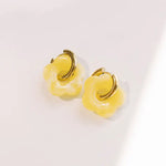 Yellow daisy earrings with removable flower charm on gold waterproof hoop