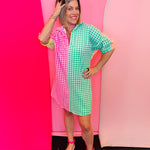 Colorblock gingham dress with pink and green panels and colorful collar details.
