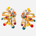 Starburst earrings with colorful enamel tips, pearl accents, and sparkling rhinestones.