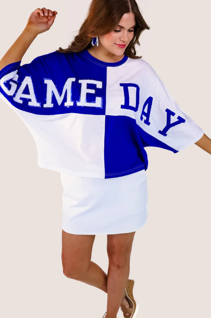 Huddle Up Color Block Top with bold color blocking, chenille and sequin patches, and trendy mom crop fit in soft polyester-rayon-spandex fabric—perfect for game day style