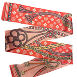 Coral chain print scarf tie styled as necklace, neck tie, or bag accessory.