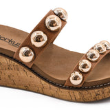 Corky’s Cognac Happy Go Lucky wedge sandals with gold studs.