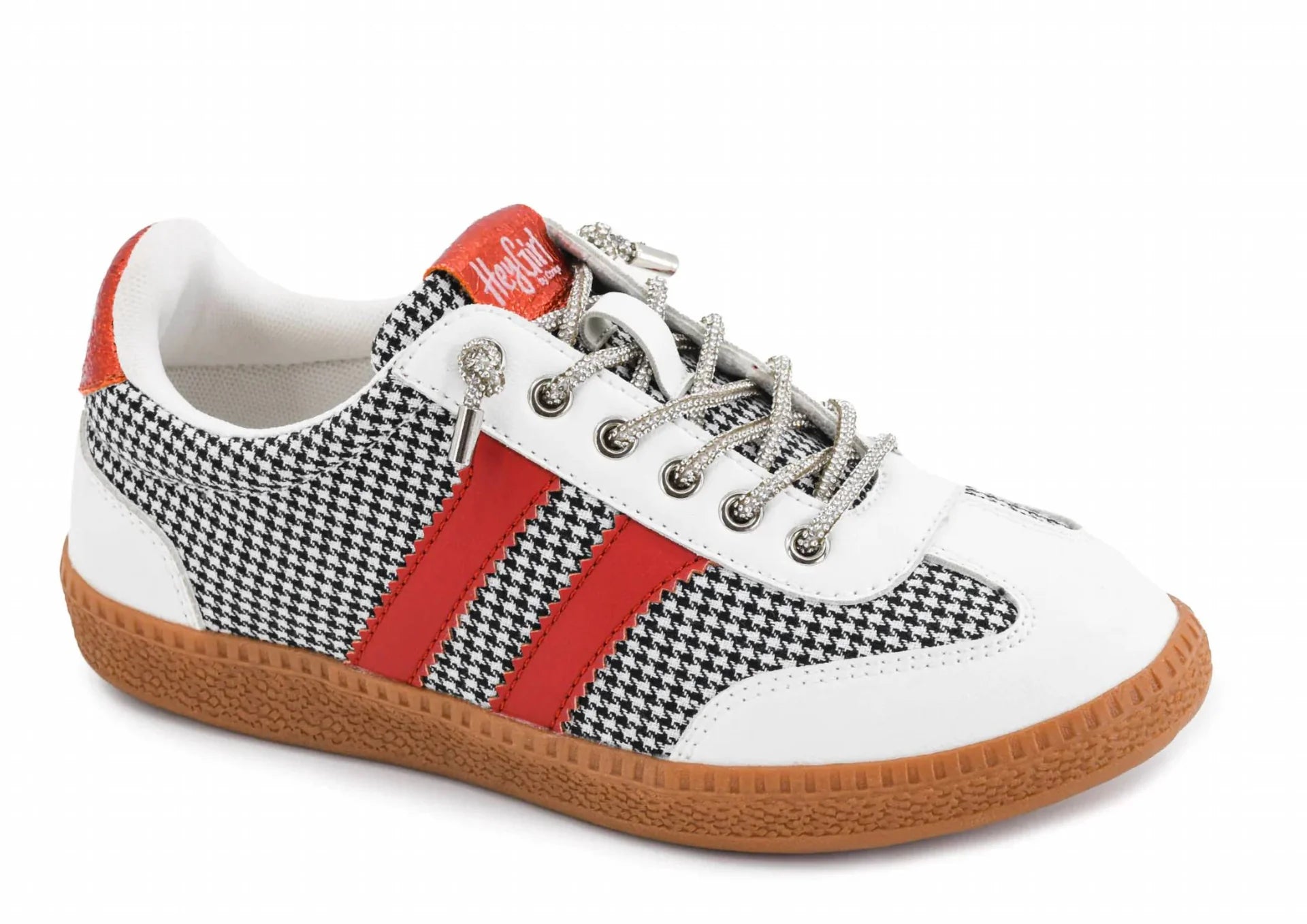 Black and white houndstooth sneakers with red accents and interchangeable laces.