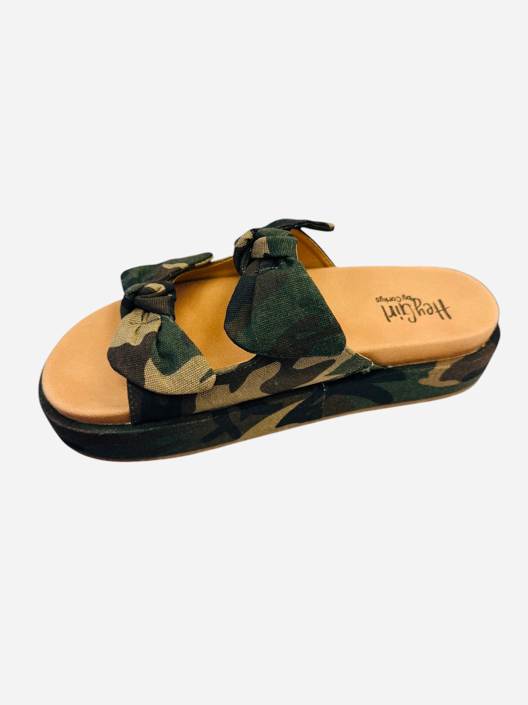 Camo slide sandals with two oversized bow straps and cushioned platform sole
