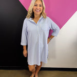 Cornflower blue striped collared shirt dress with button front, chest pocket, and three-quarter sleeves