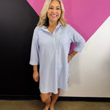 Cornflower blue striped collared shirt dress with button front, chest pocket, and three-quarter sleeves