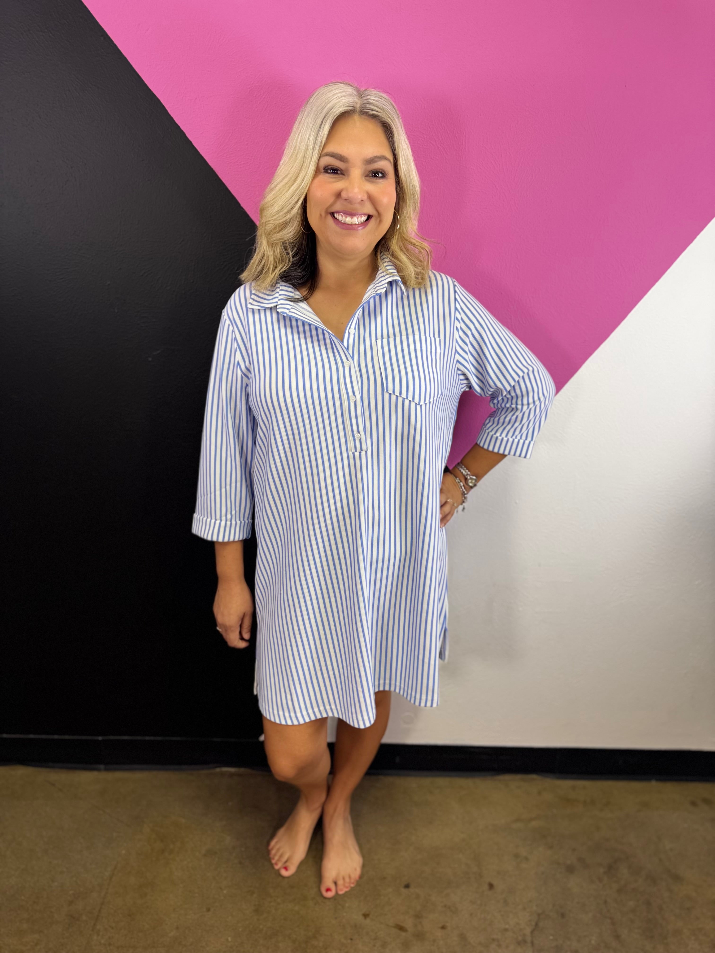 Cornflower blue striped collared shirt dress with button front, chest pocket, and three-quarter sleeves