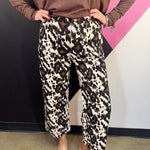 Cow print wide leg pants with oversized utility pockets and cropped ankle length