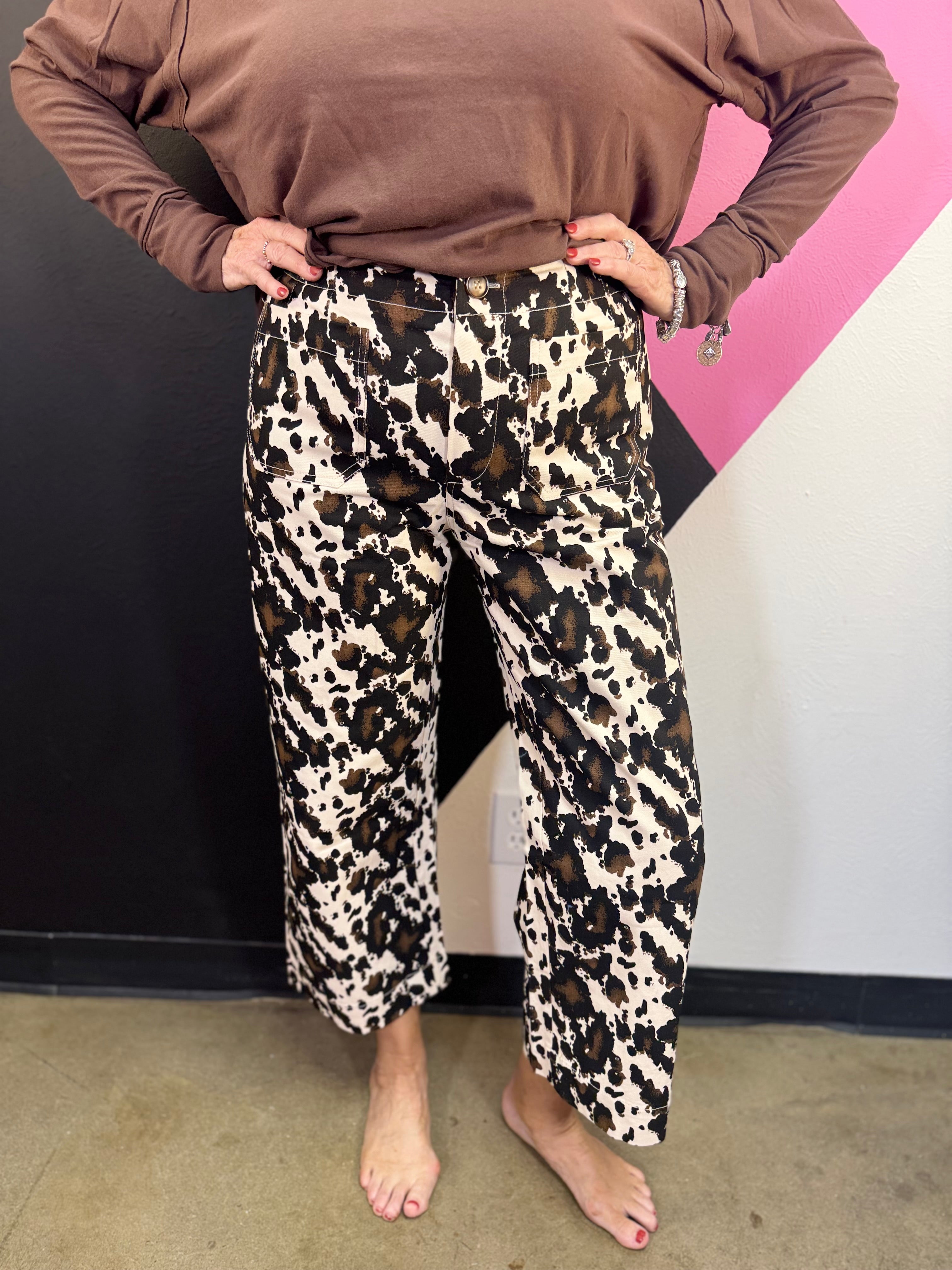Cow print wide leg pants with oversized utility pockets and cropped ankle length