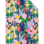 Crae Aster hand towel with colorful abstract flowers, leaves, dots, and whimsical shapes.