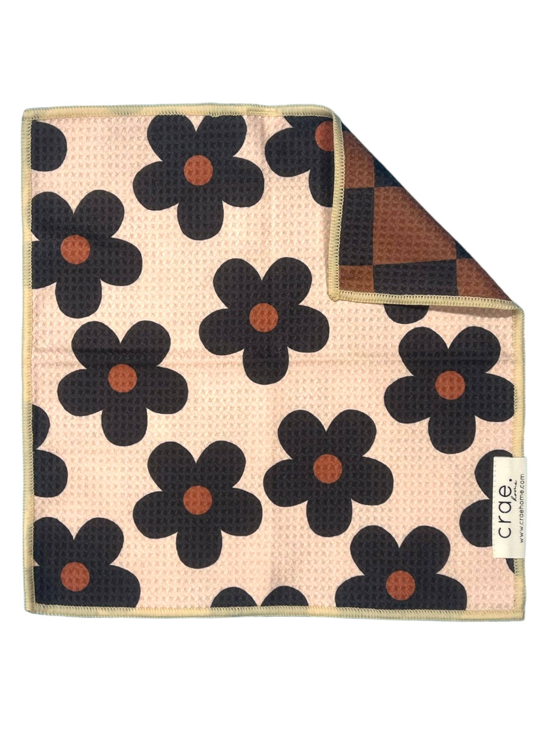 Reversible microfiber washcloth with brown checkered print and beige floral pattern