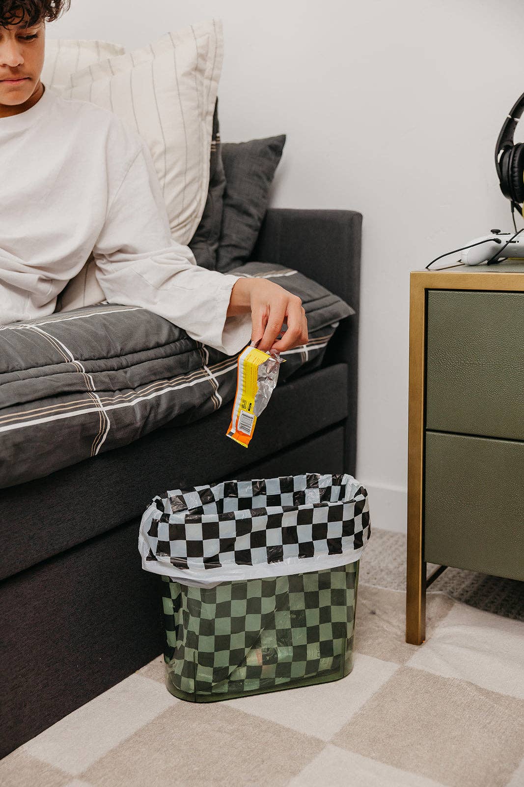 Black and white checkered 4-gallon trash liners for small waste baskets.