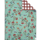 Crae Reversible hand towel with green floral print on one side and brown gingham pattern on the other.