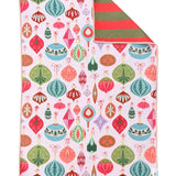 Reversible Christmas towel with red and green stripes and colorful retro ornament print.