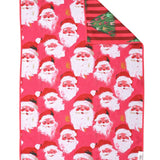 Reversible Christmas hand towel with vintage Santas and pink striped Christmas trees.