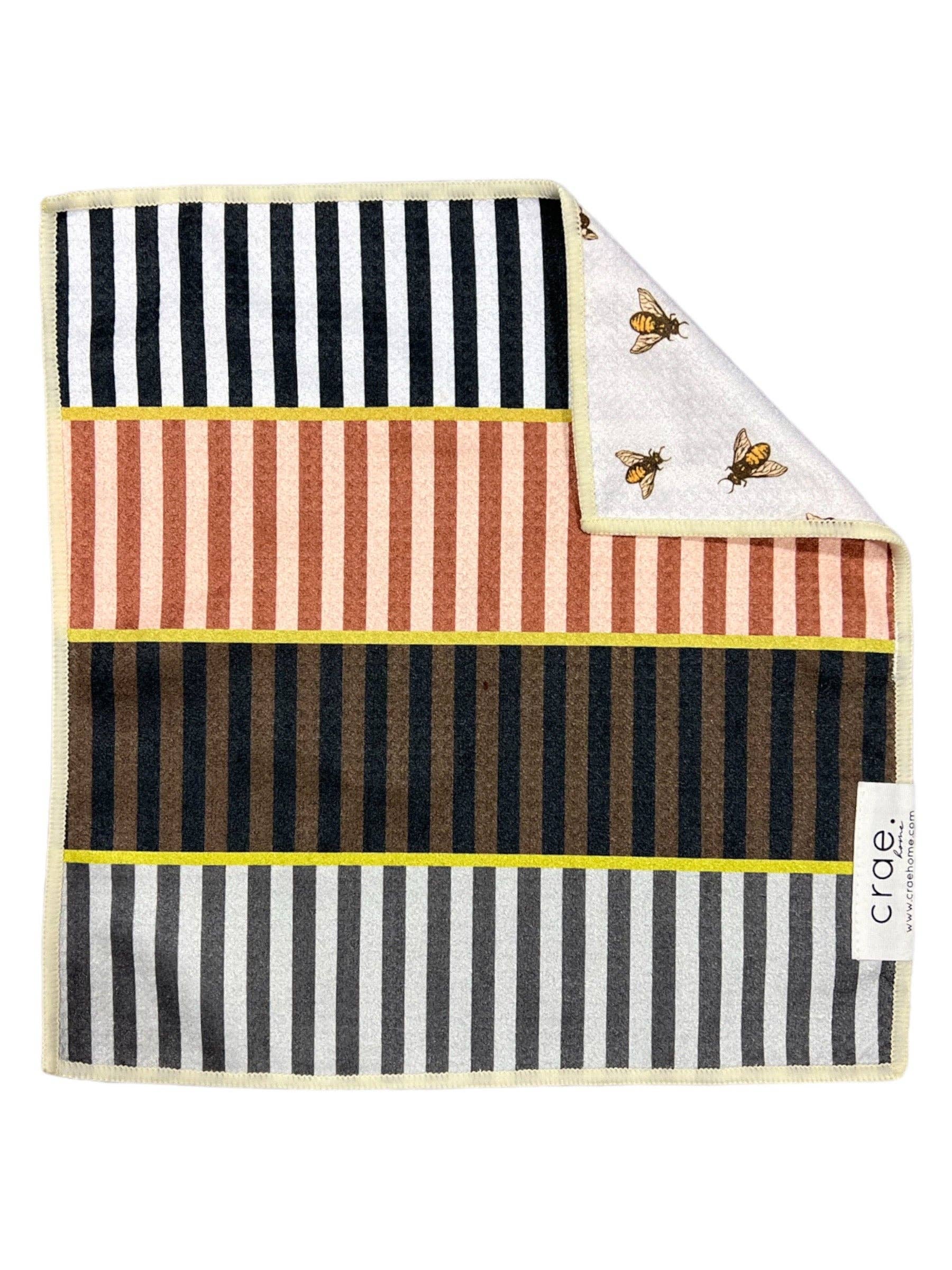 Reversible microfiber washcloth with colorful stripes and bee print design