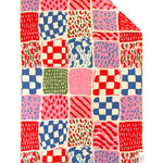 Crae Mix And Match hand towel with colorful checkerboard, stripes, dots, waves, and patchwork prints.