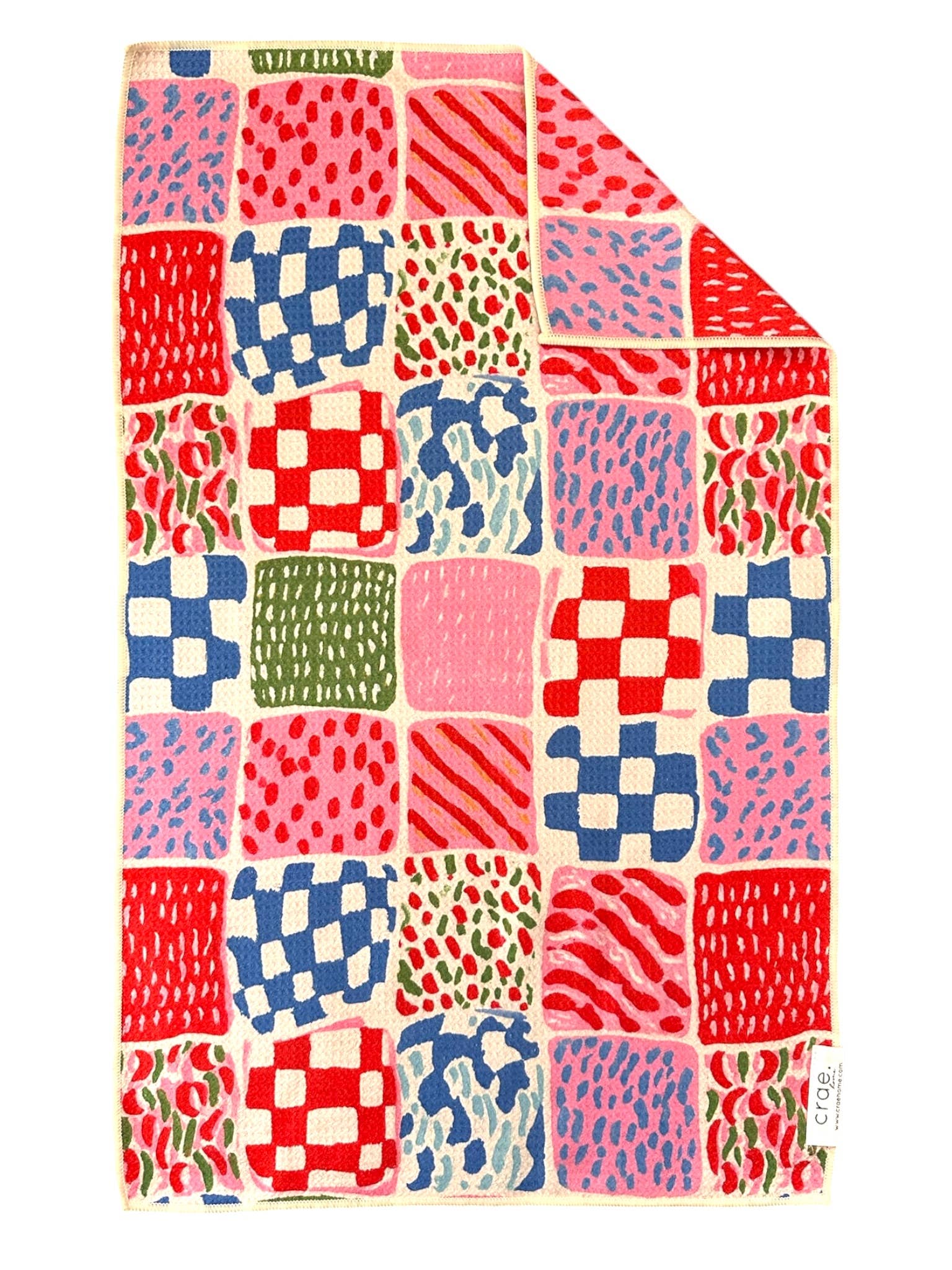 Crae Mix And Match hand towel with colorful checkerboard, stripes, dots, waves, and patchwork prints.