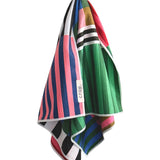 Crae Palette Play reversible towel with colorful stripes and bold geometric color-block patterns.